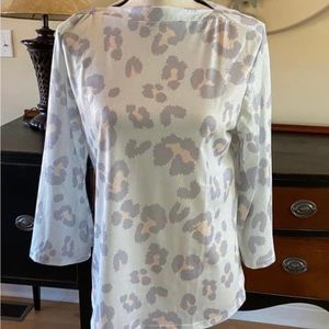 Ladies size medium, snow leopard too. So cute! New without tag.